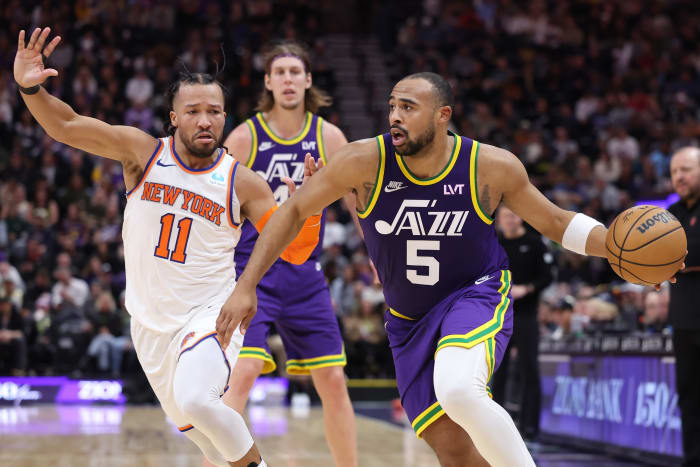 Dec 13, 2023; Salt Lake City, Utah, USA; Utah Jazz guard Talen Horton-Tucker (5) drives to the basket by New York Knicks guard Jalen Brunson (11) during the fourth quarter at Delta Center.